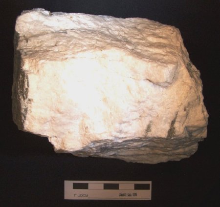 mineral sample of petzite and native gold in quartz