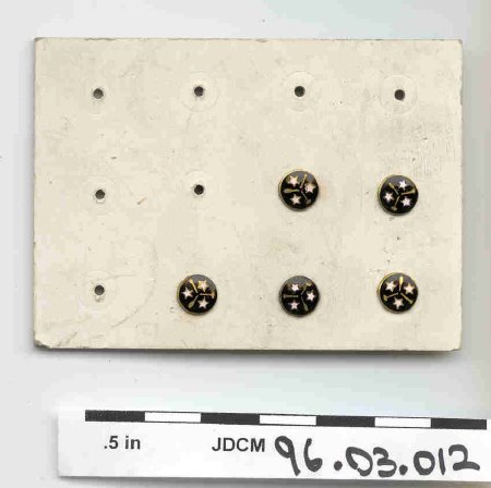 5 Union Pins on Cardboard