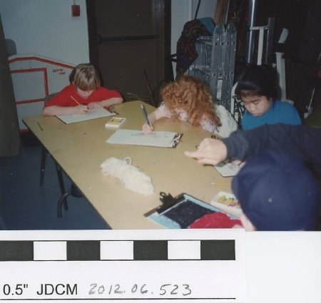 Children working on cliip boards