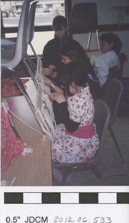 Children weaving