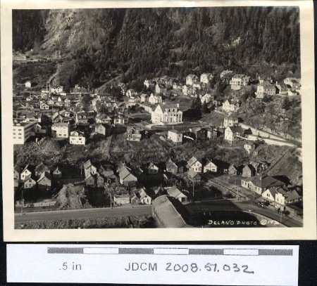 Aerial cityscape of Juneau with governors mansion ~1936