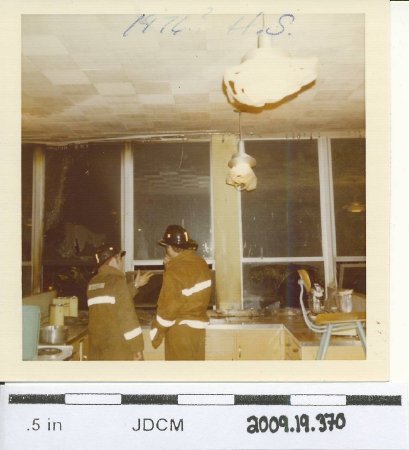 color photo, firefighters in classroom