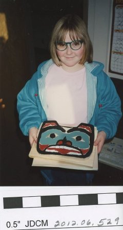 Child working with native art