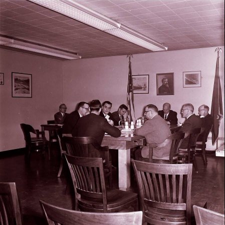 Men working around a table