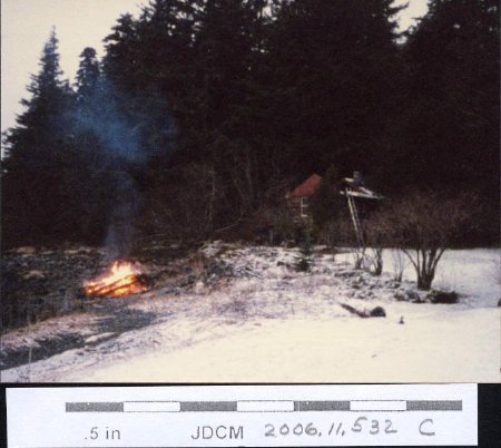 Tearing down log cabin March 1987