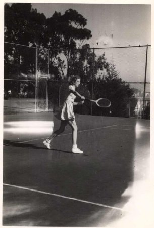 Caroline playing tennis in high school, CA