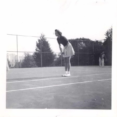 Caroline playing tennis in high school, CA