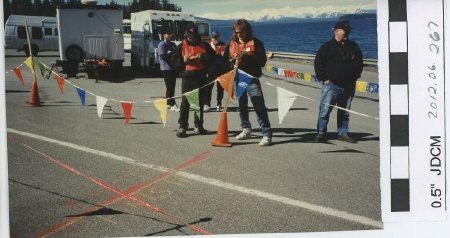 Waiting for racers to cross the finish line.  Timers Rick and Bern Savkikko