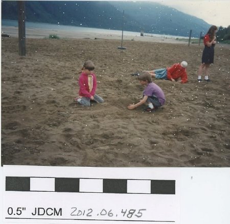 Children playing on a sandy beach