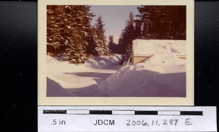 Shoveling snow off roof 1972