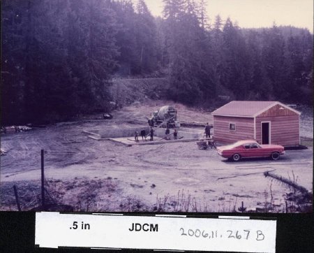 Pouring house foundation 1966 (note cedar siding on generator shed)