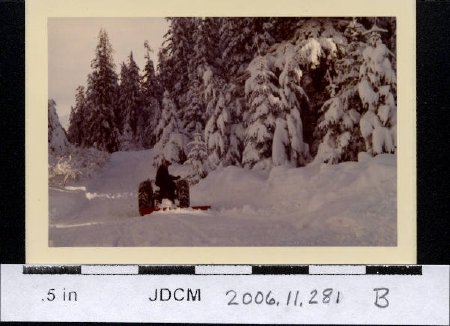 Carl Jensen clearing snow  1971