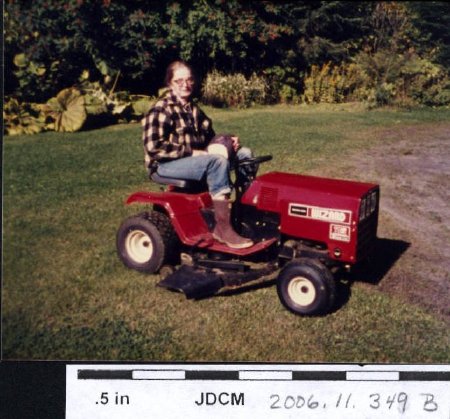 Caroline Jensen on riding lawn mover 1985