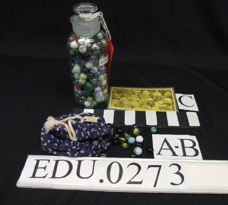 Marbles for playing and game cards