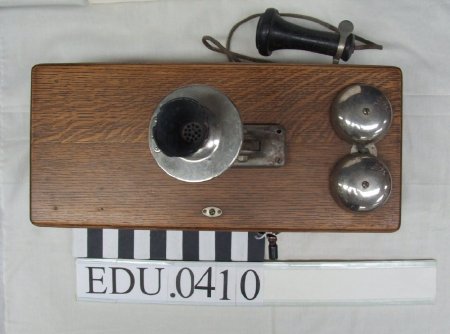 Handcrank wood wall telephone with metal bell ringer